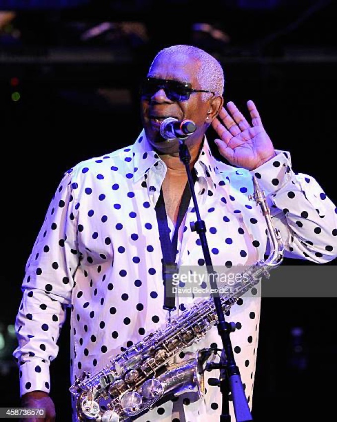 Dennis 'Dee Tee' Thomas performing live in polka dots
