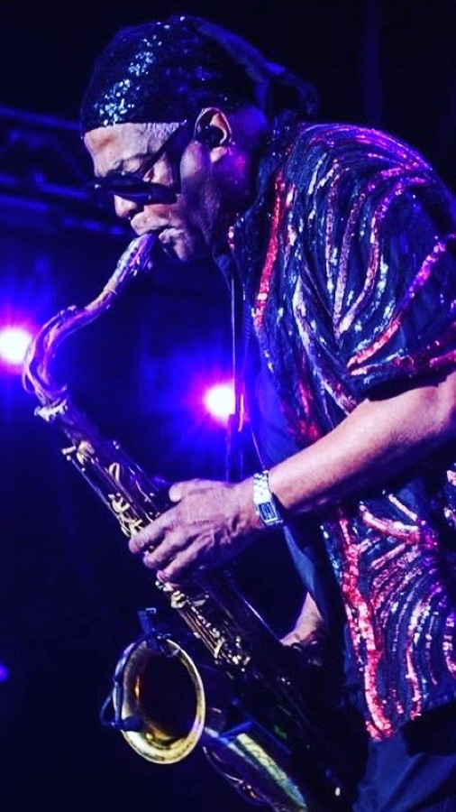 Ronald 'Khalis' Bell performing on saxophone
